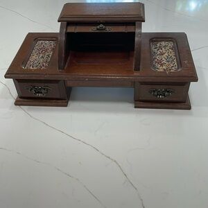 Vintage wood roll top jewelry box.